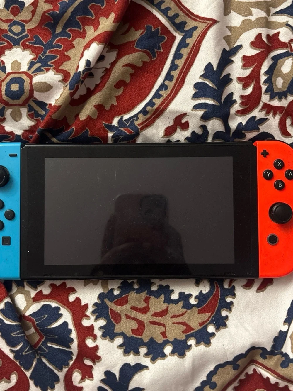 Nintendo Switch with Blue Left and Red Right Joy-Con
